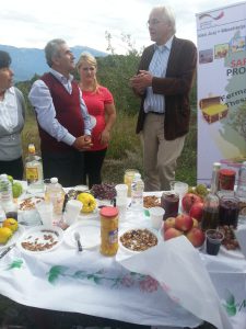 Farmer Gà«zim Kuqi speaks to German Ambassador Hellmut Hoffmann during a tour of his Drobonik, Berat farm. (Photo: A. Balla)